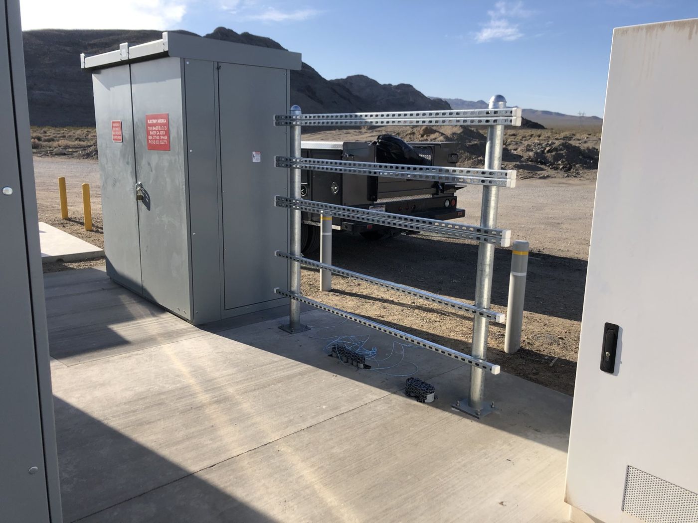 Electrical gear and strut rack at a desert battery site